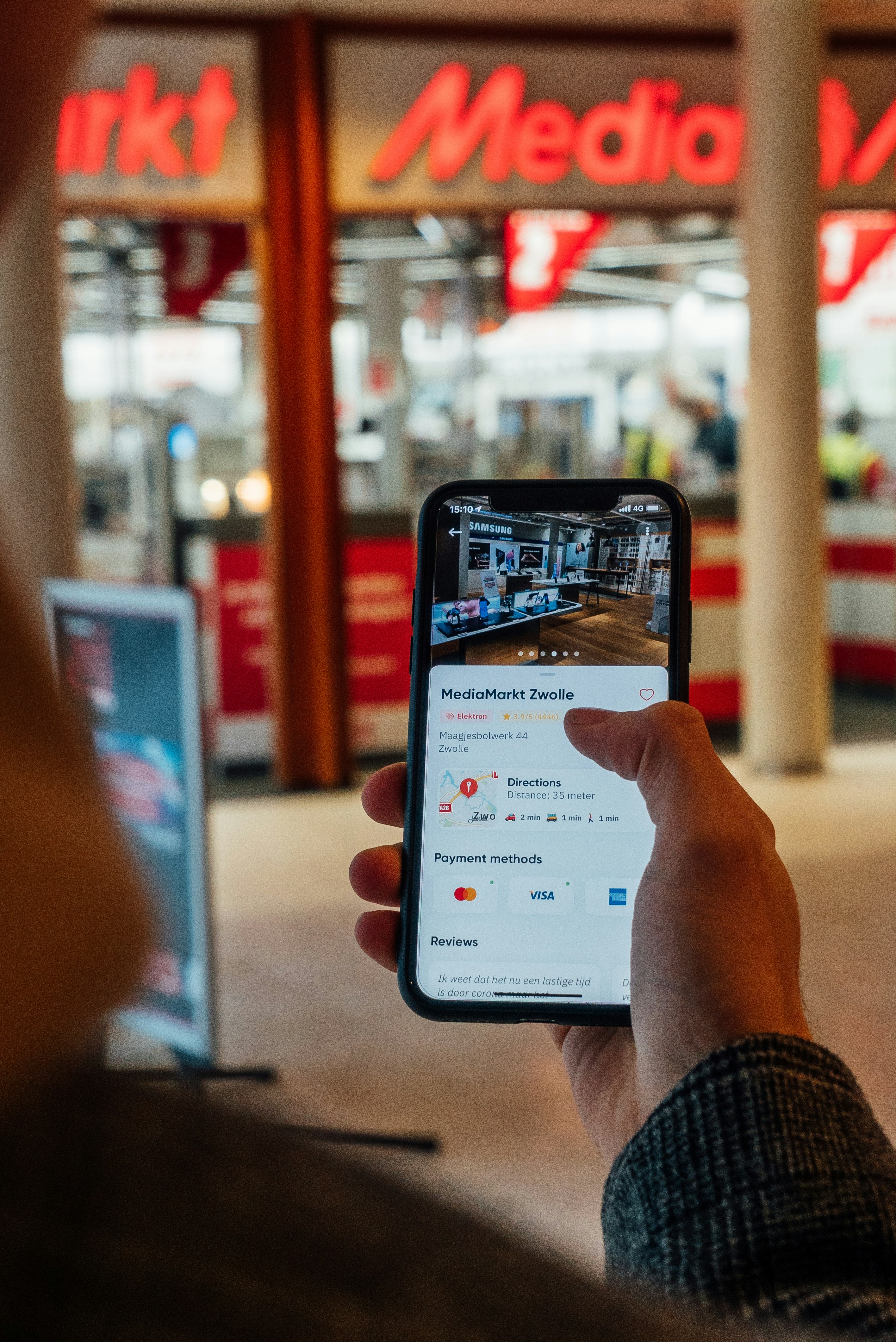 Local business owner checking Google Maps on a mobile phone